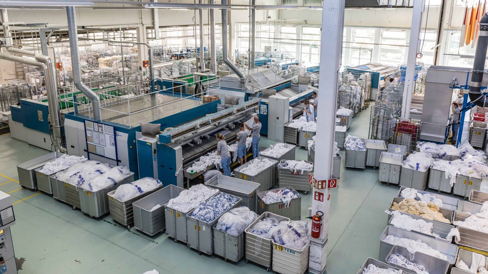Lavanderia industriale con flussi di dati